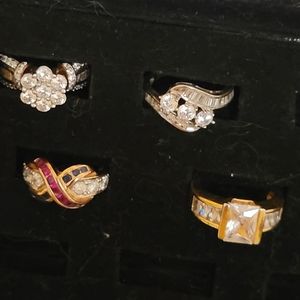 4 Rings Silver and Gold.